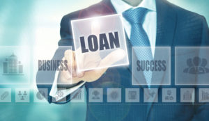 Businessman selecting a virtual loan option on a digital interface.